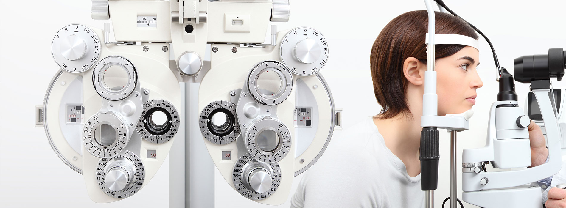 The image shows a modern dental clinic interior with various pieces of equipment, including a dental chair and an X-ray machine.
