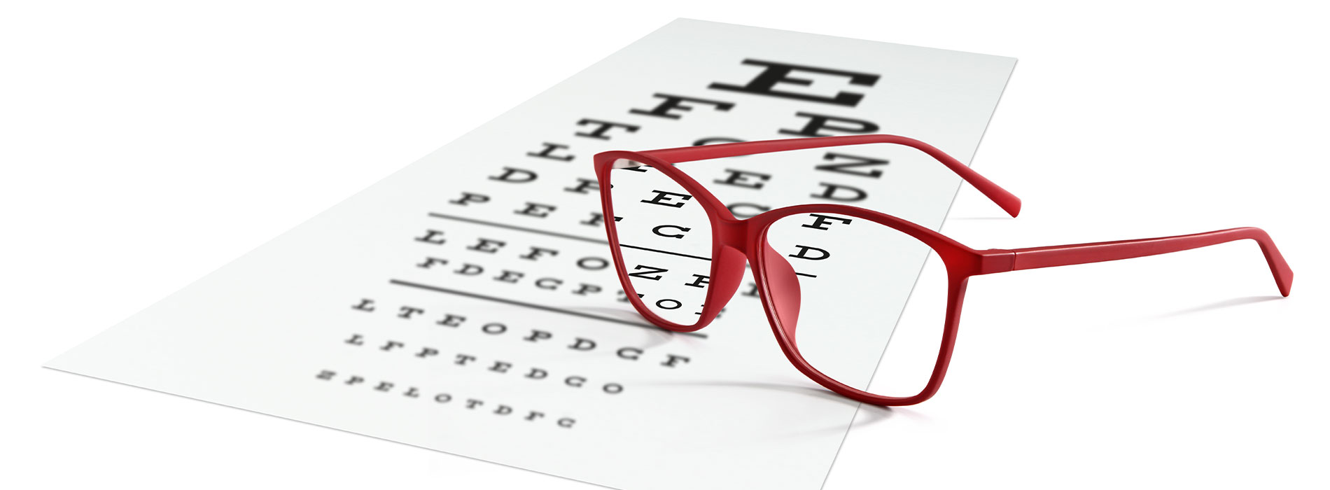 A person is seated in a dental chair, receiving care from a dental professional who stands behind them.